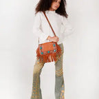 Beautiful western-inspired Country Charm Handbag with rustic details and leather finish for everyday country fashion.
