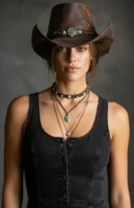 Stylish Mexican cowboy hat in neutral tone with detailed band and curved brim