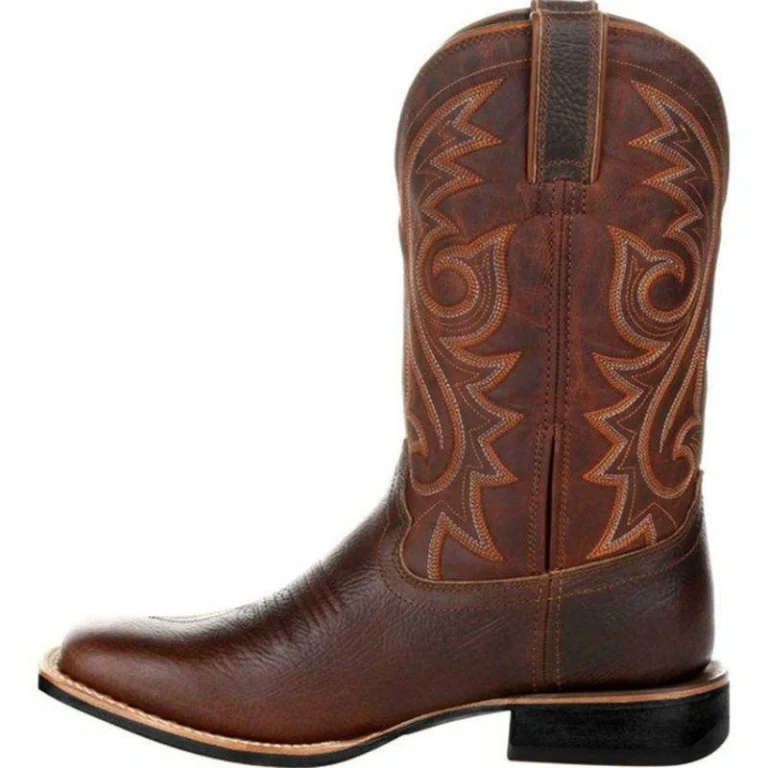 Women’s rodeo boots in rich brown leather with detailed Western stitching, pointed toe, and stacked heel.