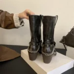 Black Roman cowboy boots with square toe, durable sole, and classic Western detailing.