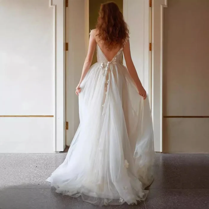 Simple boho wedding dress with lightweight fabric and relaxed bridal style