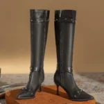 Women's red leather zip up cowboy boots with decorative stitching