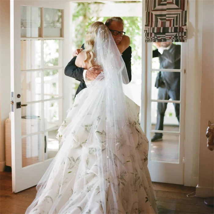 Elegant camo wedding dress with white lace top and camouflage skirt