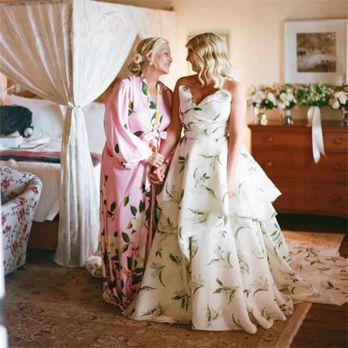 White camo wedding dress with layered camouflage skirt and lace bodice