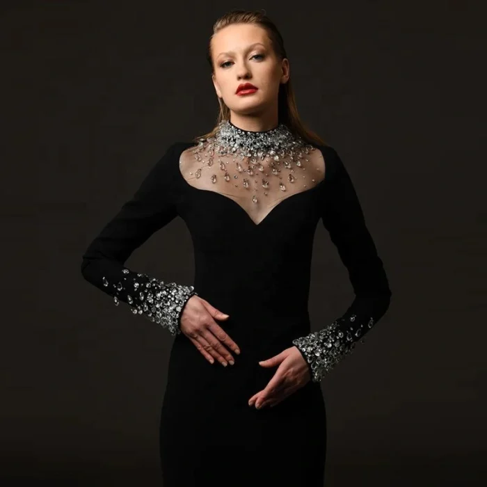 Modern black wedding dress bride look with fitted gown and stylish bridal accessories