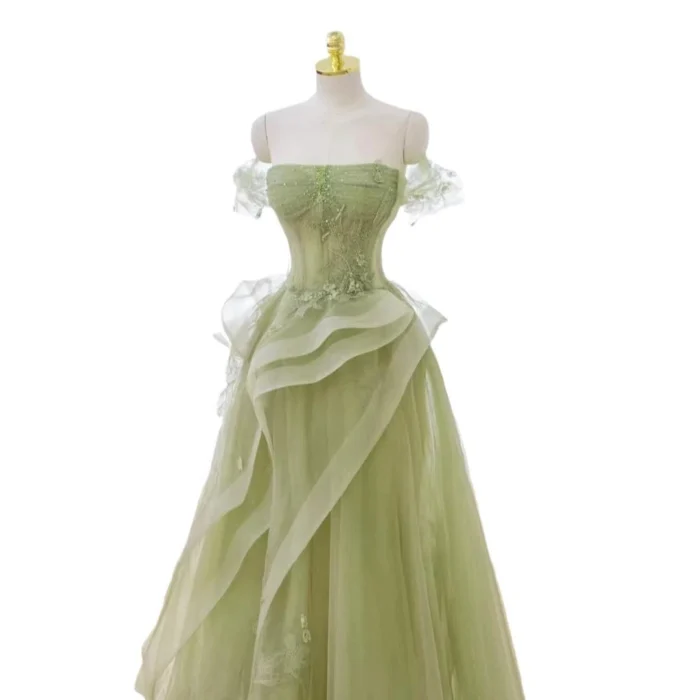 Wedding dress for forest wedding with nature-inspired green gown and romantic style