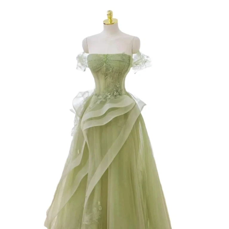 Wedding dress for forest wedding with nature-inspired green gown and romantic style