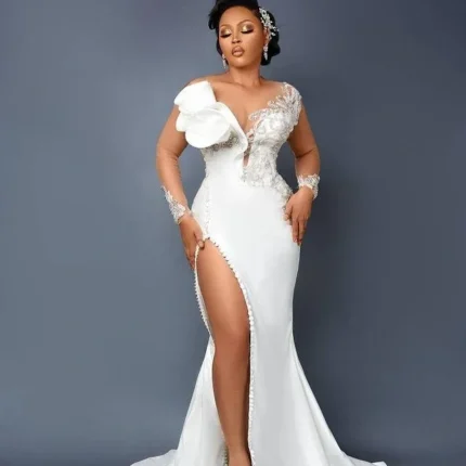 Ethiopian wedding dress traditional Habesha Kemis with white fabric and detailed embroidery