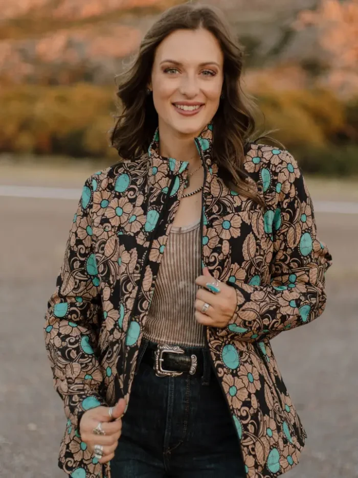 Women’s Western Blazer Outfit Style Woman wearing a tailored women’s western blazer styled with cowboy boots and denim jeans