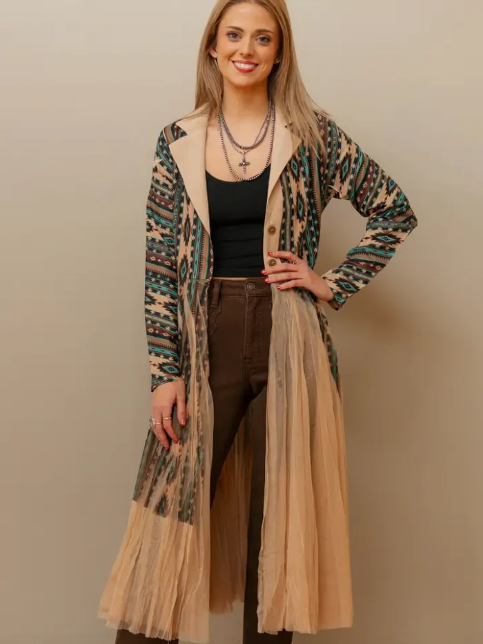 Women’s Western Kimono Boho Style Out Woman wearing a flowing women’s western kimono styled with denim jeans and cowboy boots for a boho cowgirl fashion look.