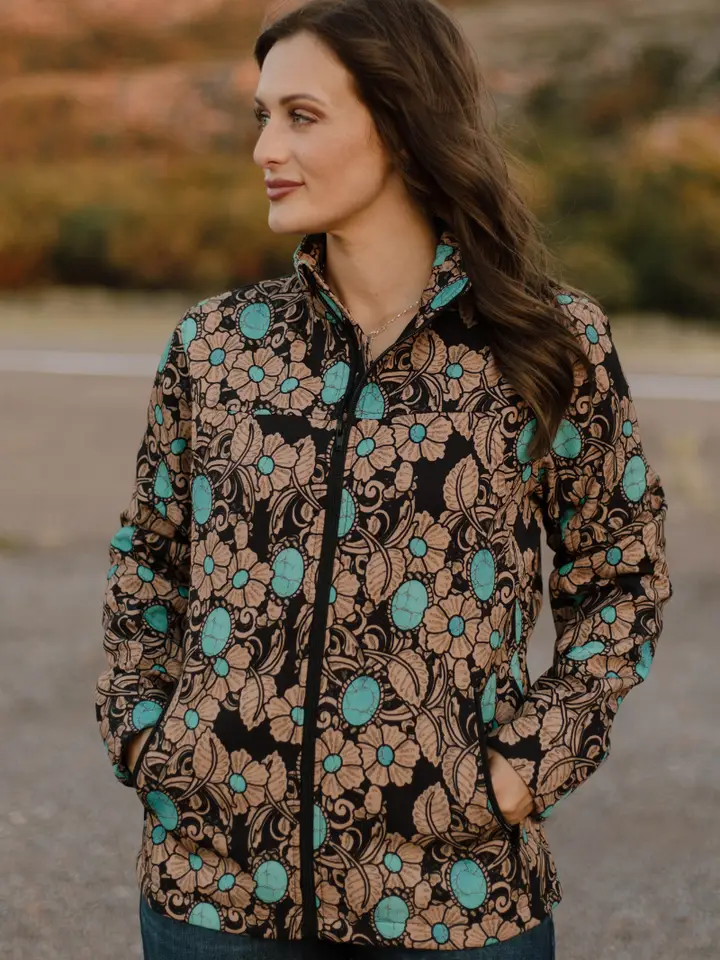 Fashionable women’s western blazer with fringe detailing and western-inspired design for rodeo and country fashion.