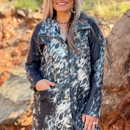 Stylish women’s western cardigan with fringe detailing paired with a boho cowgirl outfit and western accessories.