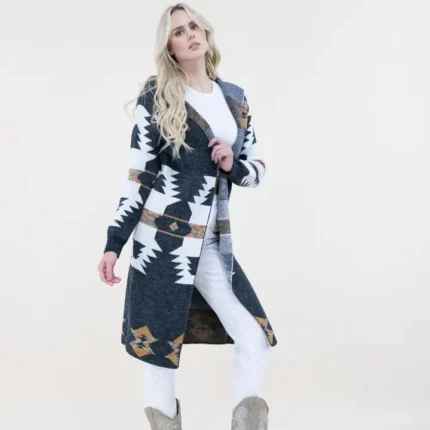 Stylish long western cardigan with Aztec patterns and hoodie design paired with cowgirl boots and casual outfit.