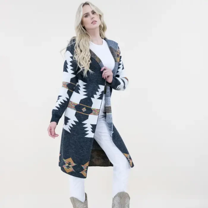 Stylish long western cardigan with Aztec patterns and hoodie design paired with cowgirl boots and casual outfit.