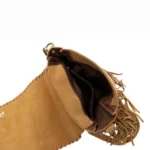 Fashionable women's western crossbody bag designed with fringe, metal accents, and spacious compartments for daily use.