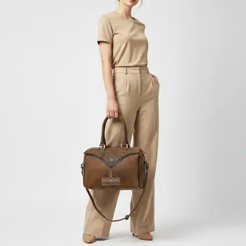 Brown Mesa Ridge western leather handbag featuring premium craftsmanship, decorative stitching, and spacious interior storage.