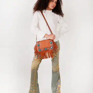 Beautiful western-inspired Country Charm Handbag with rustic details and leather finish for everyday country fashion.