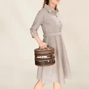 Stylish women's Dusty Trail leather purse featuring spacious compartments, antique metal details, and rustic western appeal.